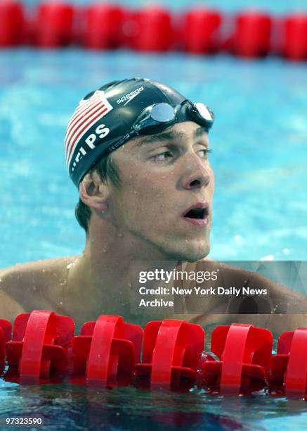 Michael Phelps looks at scoreboard after failing to win Men's 200m Freestyle.