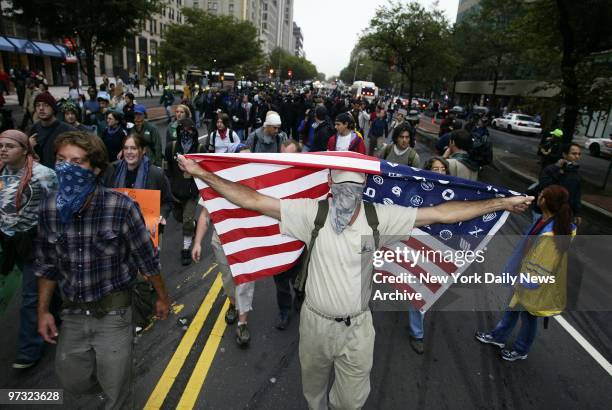 Demonstrators protesting the policies of the International Monetary Fund and the World Bank march down K St. This morning. About 600 protesters were...