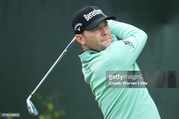 Branden Grace of South Africa plays his shot from the second tee during a practice round prior to the 2018 U.S. Open at Shinnecock Hills Golf Club on...