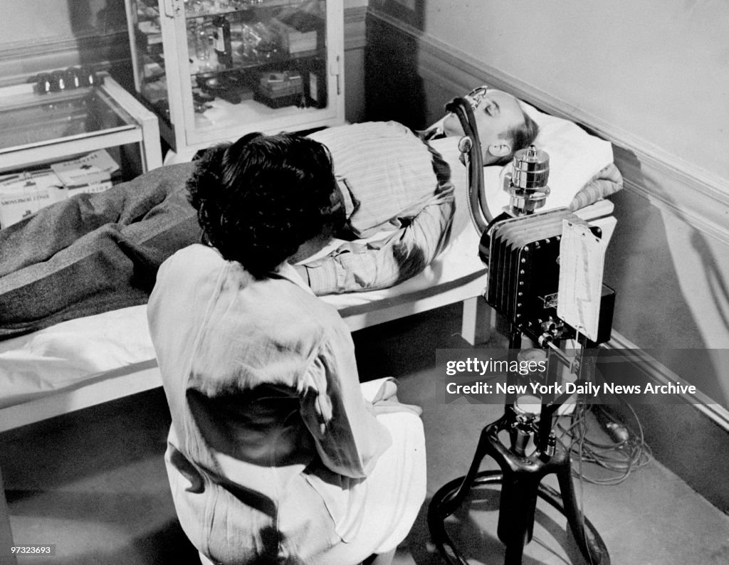 Stutterer undergoes basal metabolism test to determine if pa