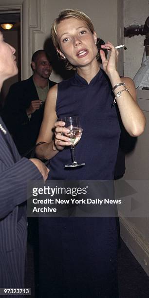 Gwyneth Paltrow having a drink at the Hammerstein Ballroom during the Seventh Annual IFP Gotham Awards.