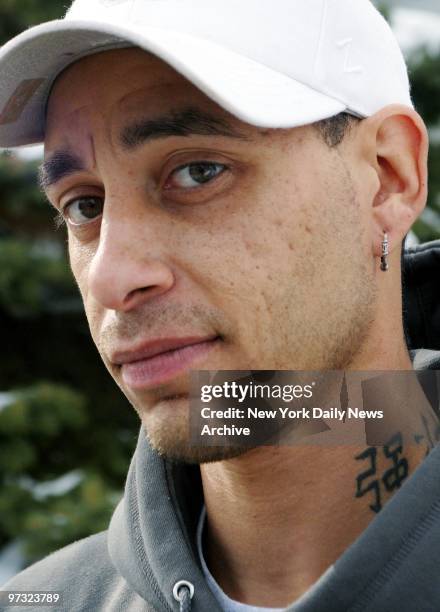 Keith Ambrosino stands outside his grandmother's home in Elmont, L.I. His half-brother, Steven Schiovone of Levittown, L.I., is accused of gunning...