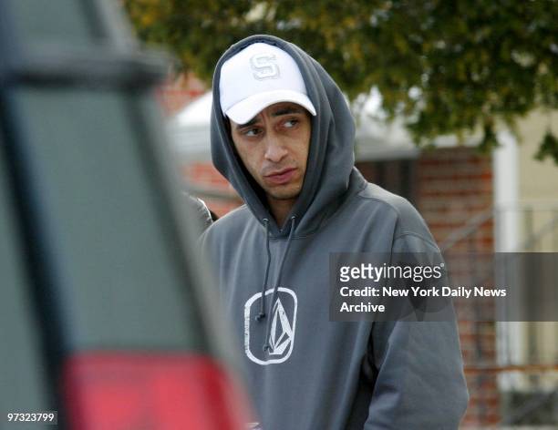 Keith Ambrosino stands outside his grandmother's home in Elmont, L.I. His half-brother, Steven Schiovone of Levittown, L.I., is accused of gunning...