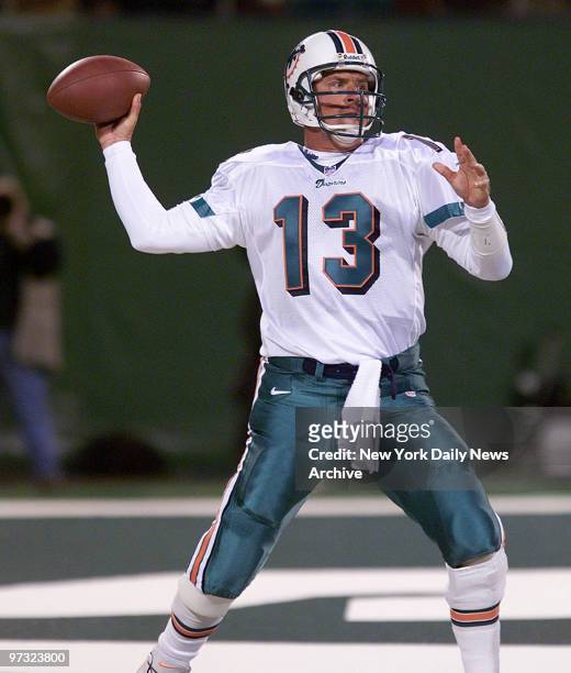 Miami Dolphins' quarterback Dan Marino is ready to launch a pass in game against the New York Jets at Giants Stadium. The Jets won, 28-20.