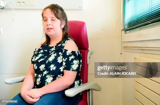 Year-old Cloe, suffering from CLOVES syndrome, poses at the Necker-Enfants Malades Hospital in Paris on June 13 following the presentation of a...