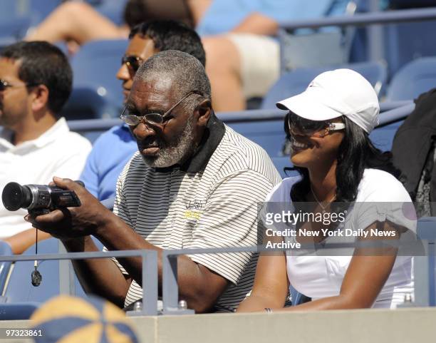Open 2009 Womens Doubles Finals: Venus Williams and Serena Williams vs Cara Black and Liezel Huber. Richard Williams father with wife during match.