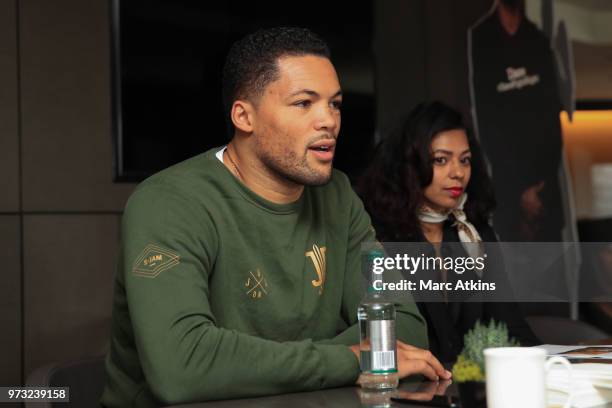 Joe Joyce speaks to the press alongside undercard fighter Ruqsana Begum during a Joe Joyce & Richard Lartey Press Conference on June 13, 2018 in...