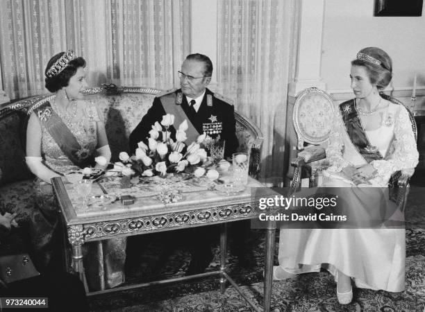 Queen Elizabeth II and Princess Anne attend a meeting with Yugoslav political leader Josip Broz Tito , in the occasion of a State Banquet at Beli...