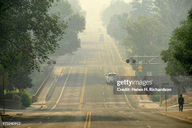 Overnight inversions in the evening from cooler air cause heavy smoke from the 416 Fire to collect in the valley and around town on June 13, 2018 in...