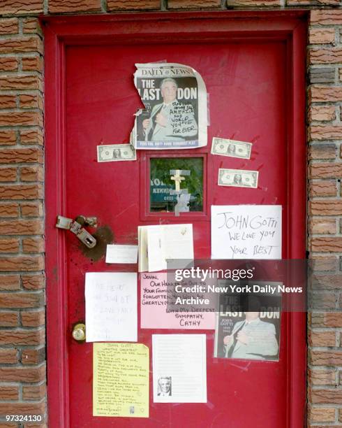 Sympathy notes and front pages of the Daily News with the headline "The Last Don" and a photo of the late John Gotti adorn the door of the Bergin...