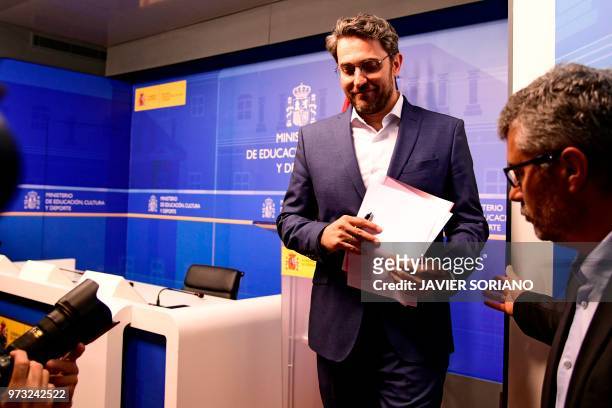 Spanish minister of culture and sports Maxim Huerta leaves after giving a press conference at the Culture Ministery in Madrid on June 13, 2018. -...