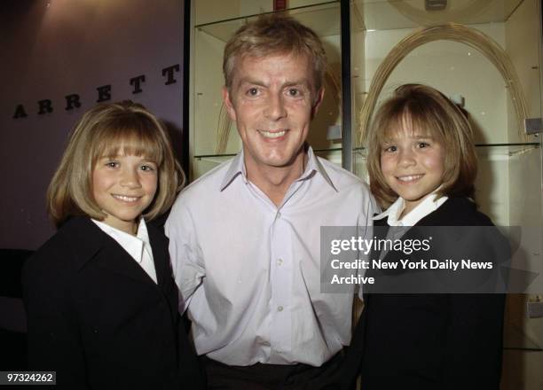 Hairstylist John Barrett with the Olsen twins, Ashley and Mary Kate. The Olsen twins are in town for the Audrey Hepburn Hollywood For Children...