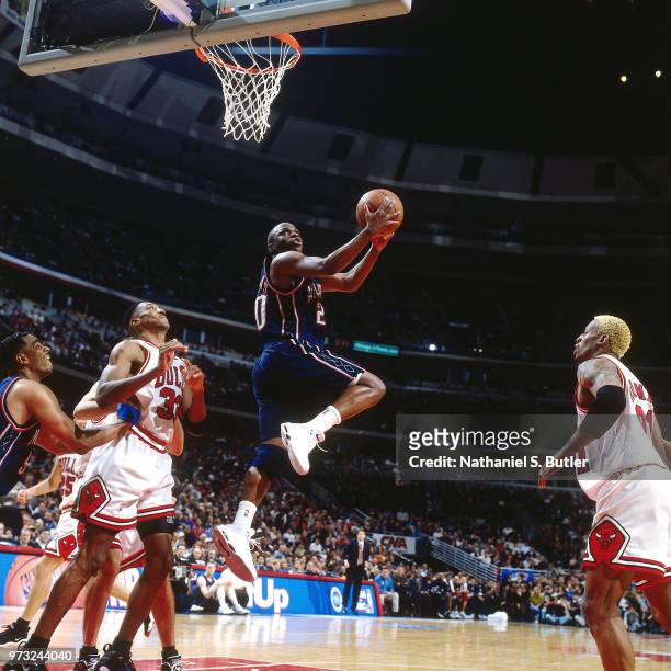 Sherman Douglas of the New Jersey Nets shoots against the Chicago Bulls during a game played on April 26, 1998 at the United Center in Chicago,...
