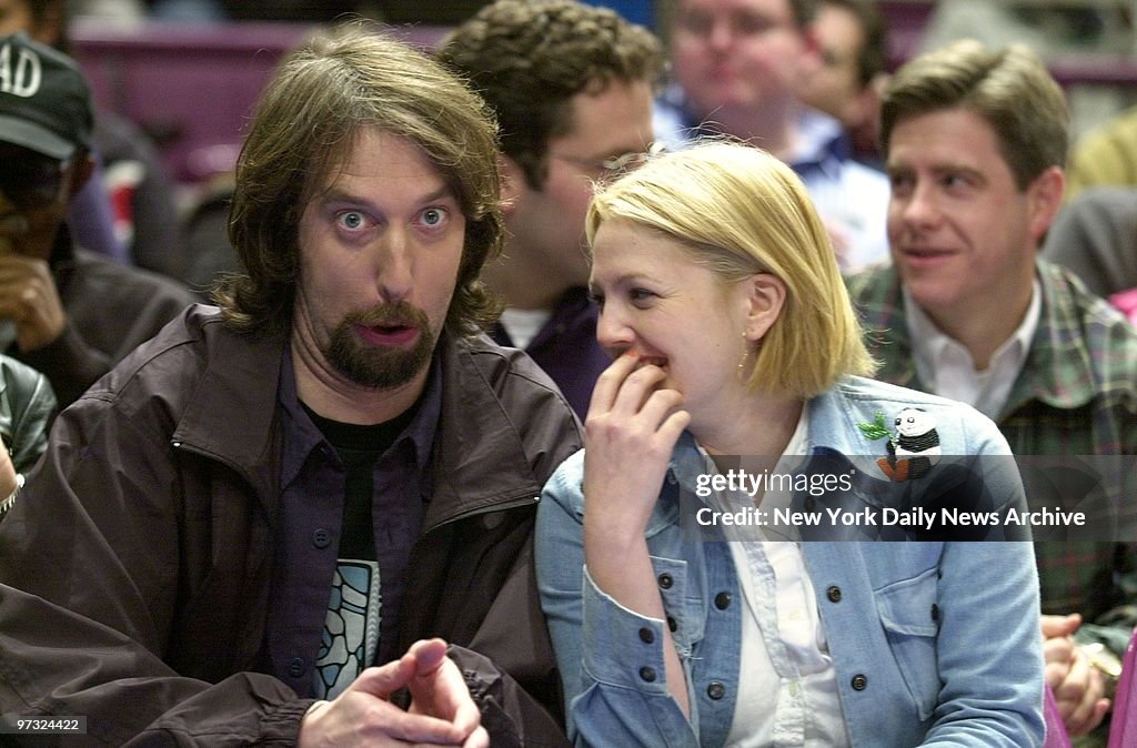 Newlyweds Tom Green and Drew Barrymore share a laugh while a