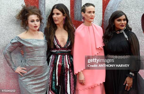 English actress Helena Bonham Carter , US actor Sandra Bullock , US actor Sarah Paulson and US actor Mindy Kaling pose on the carpet upon arrival to...