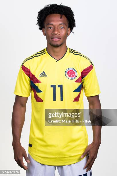 Juan Cuadrado of Colombia poses for a portrait during the official FIFA World Cup 2018 portrait session at Kazan Ski Resort on June 13, 2018 in...
