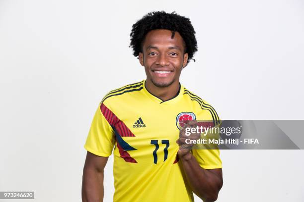 Juan Cuadrado of Colombia poses for a portrait during the official FIFA World Cup 2018 portrait session at Kazan Ski Resort on June 13, 2018 in...