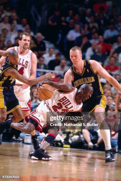 Michael Jordan of the Chicago Bulls drives during a game played on May 19, 1998 at the United Center in Chicago, Illinois. NOTE TO USER: User...
