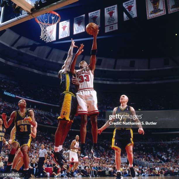 Scottie Pippen of the Chicago Bulls shoots during a game played on May 19, 1998 at the United Center in Chicago, Illinois. NOTE TO USER: User...