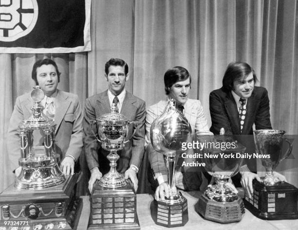 Award winners show their trophies: Hawks' Tony Esposito, Vezina award; Rangers' Jean Ratelle, Lady Byng award; Bruins' Bobby Orr, Hart and Norris...