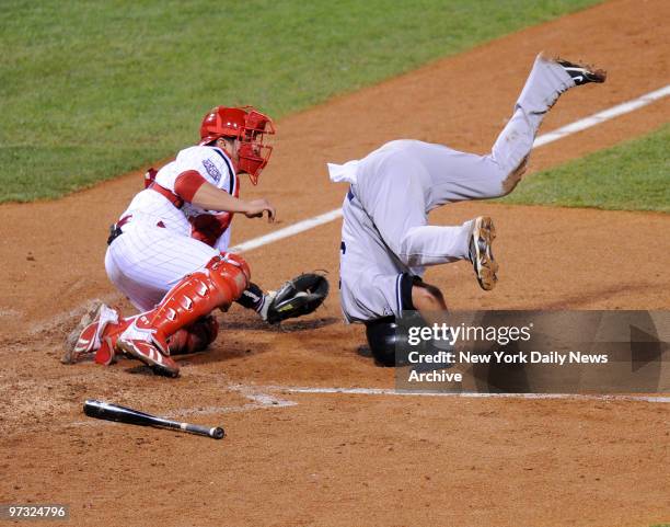 Nick Swisher scores on Andy Pettitte single in the fifth inning of World Series Game 3, New York Yankees against the Philadelphia Phillies at...