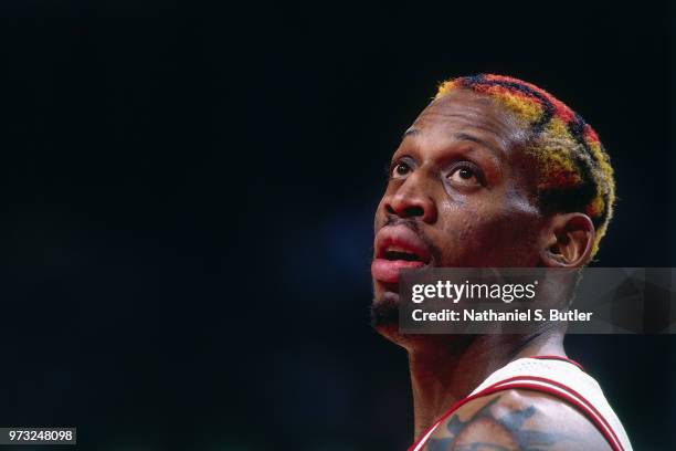 Dennis Rodman of the Chicago Bulls looks on during a game played on May 3, 1998 at the United Center in Chicago, Illinois. NOTE TO USER: User...