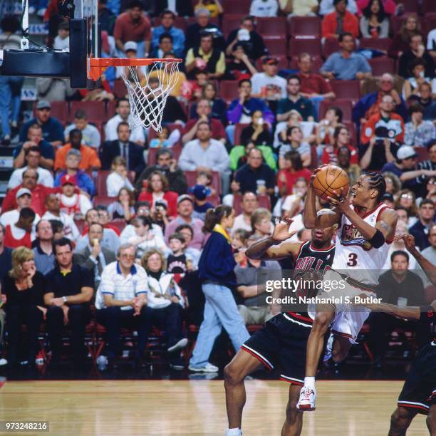 Allen Iverson of the Philadelphia 76ers shoots against the Chicago Bulls during a game played on April 17, 1998 at the First Union Arena in...