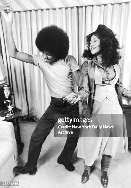 Michael Jackson dances with his 21-year-old sister LaToya in apartment they share on the East Side. Michael had just left the Jackson Five and was...