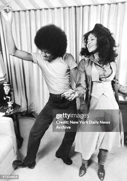 Michael Jackson dances with his 21-year-old sister LaToya in apartment they share on the East Side. Michael had just left the Jackson Five and was...