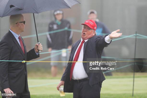 Donald Trump impersonator attends a practice round prior to the 2018 U.S. Open at Shinnecock Hills Golf Club on June 13, 2018 in Southampton, New...