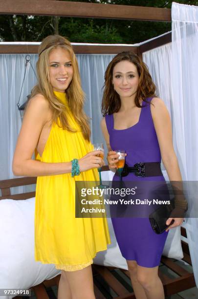 Hamptons Parties Actress Emmy rossum and her Friend Model Cody Horn at the perrier jouet hosted alice + olivia show at the emm group estate in Sag...