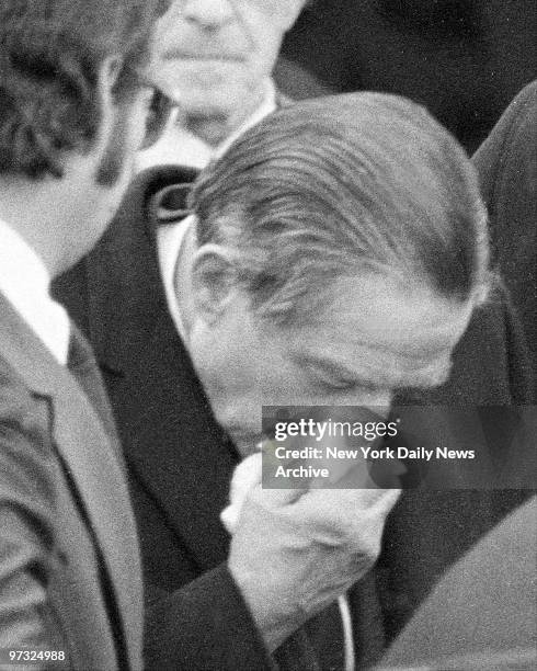 Michael Brigante, father of Louise DeFeo, weeps after Mass outside St. Martin of Tours Catholic Church in Amityville, L.I., for Ronald DeFeo, his...
