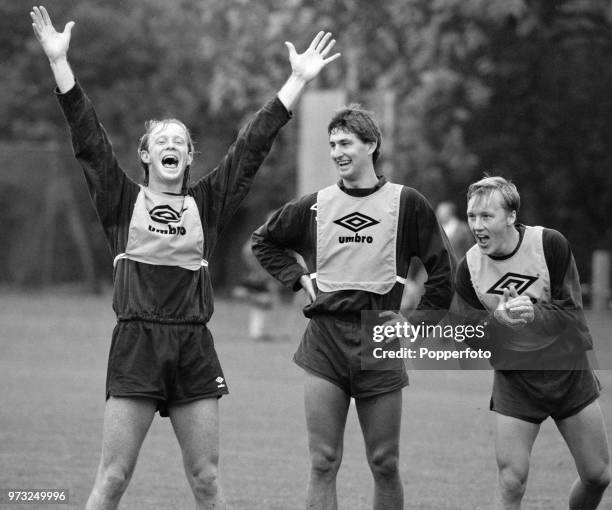 England footballers Mark Wright , Tony Adams and Lee Dixon during training at Bisham Abbey on October 15, 1990 in Bisham, England.