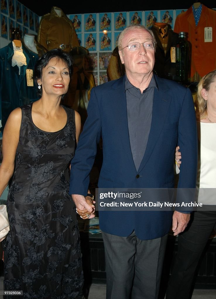 Michael Caine and wife Shakira at Barneys New York where a p