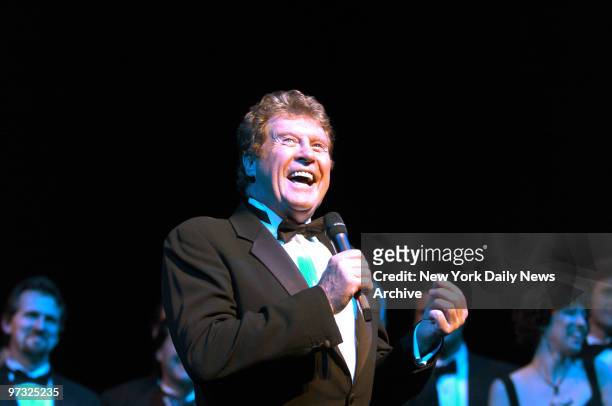 Michael Crawford speaks to the audience at the Majestic Theatre following the 7,486th performance of the musical "The Phantom of the Opera," making...