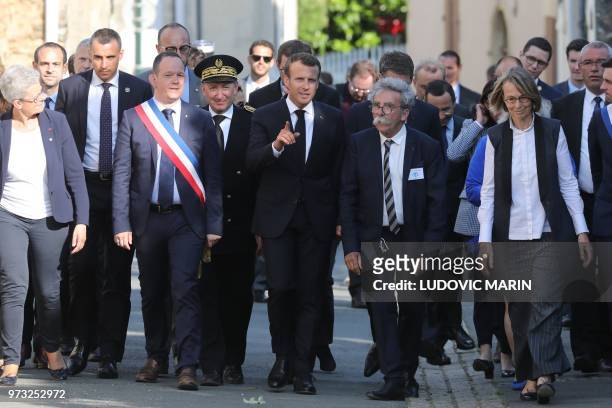 French President Emmanuel Macron and French Culture Minister Francoise Nyssen , flanked by Mouilleron st Germain's Mayor Valentin Josse , visit the...