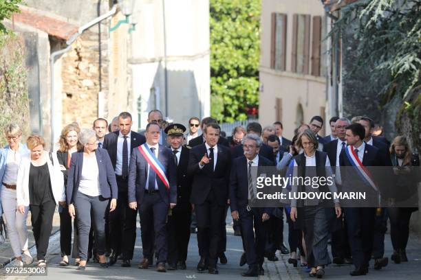 French President Emmanuel Macron and French Culture Minister Francoise Nyssen , flanked by Mouilleron st Germain's Mayor Valentin Josse , visit the...