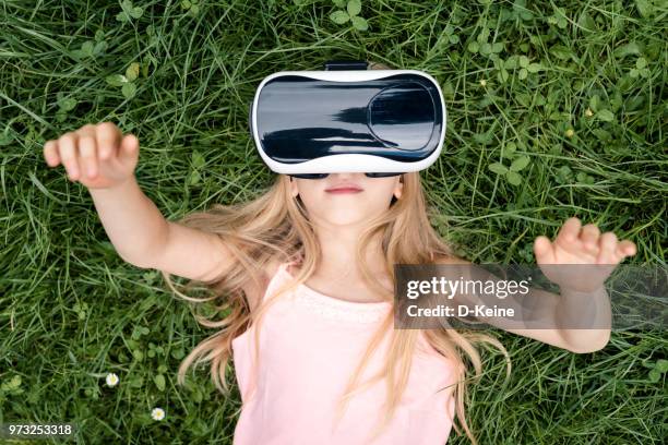 virtual reality - vr headset kid stock pictures, royalty-free photos & images