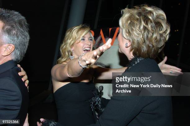 Kate Winslet greets Sen. Hillary Clinton with a hug at the Brooklyn Museum where the New York premiere of the movie "Finding Neverland" was held....