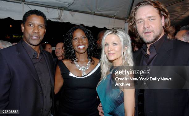 Denzel Washington and his wife Pauletta attend the World Premiere of "American Gangster" with Russell Crowe and his wife Danielle at the Apollo...