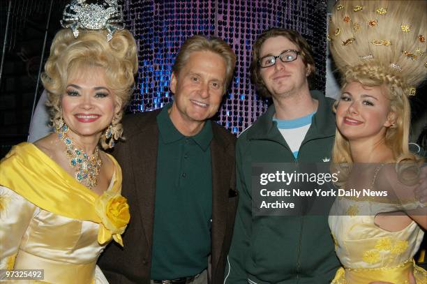 Michael Douglas and son Cameron get acquainted with two "Hairspray" cast members during a backstage visit at the Neil Simon Theater.