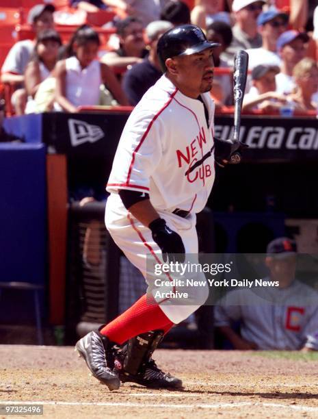 New York Mets' Benny Agbayani connects for a run-scoring single in the seventh inning on the way to a 6-2 victory over the Toronto Blue Jays on Negro...