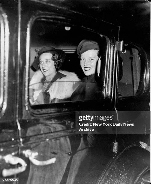 Katharine Hepburn and Mrs. Catherine Harding Taylor leaving Penn Station.