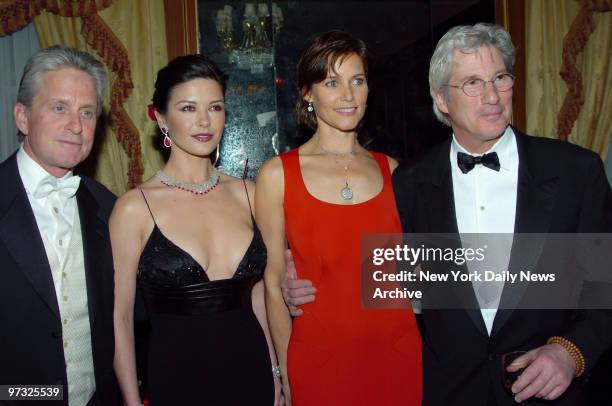 Michael Douglas and wife Catherine Zeta-Jones, who is the honorary chairwoman, join Honorees Carey Lowell and husband Richard Gere at the Eighth Red...