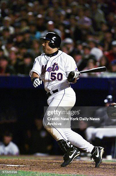 New York Mets' Benny Agbayani smacks an RBI double in the eighth inning to give the Mets the go-ahead run. The Mets went on to defeat the New York...