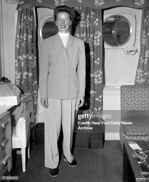 Katherine Hepburn in her cabin on the S.S. America which is sailing for Europe.