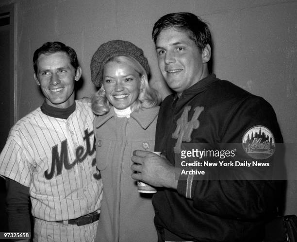 New York Mets' Bud Harrelson and Tom Seaver, along with Seaver's wife Nancy, celebrate Seaver's consectutive strikeout record and new day-game record...