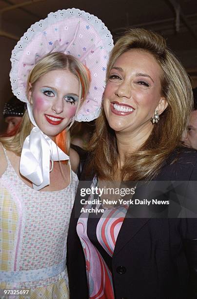 Nicky Hilton - looking like Little Bo Peep - and songwriter Denise Rich backstage at Gracie Mansion Gallery on W. 27th St. For Size 6, an art and...