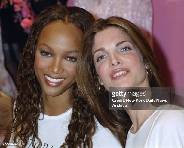Supermodels Tyra Banks and Stephanie Seymour put their heads together at the Victoria's Secret shop on Fifth Ave. They were on hand for the...