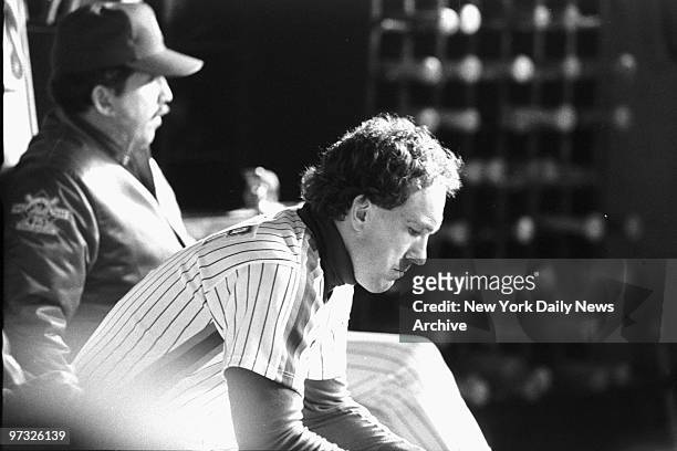 New York Mets' catcher Gary Carter sits dejected in dugout. Boston Red Sox defeated Mets, 9-3, in Game Two of the 1986 World Series at Shea Stadium.